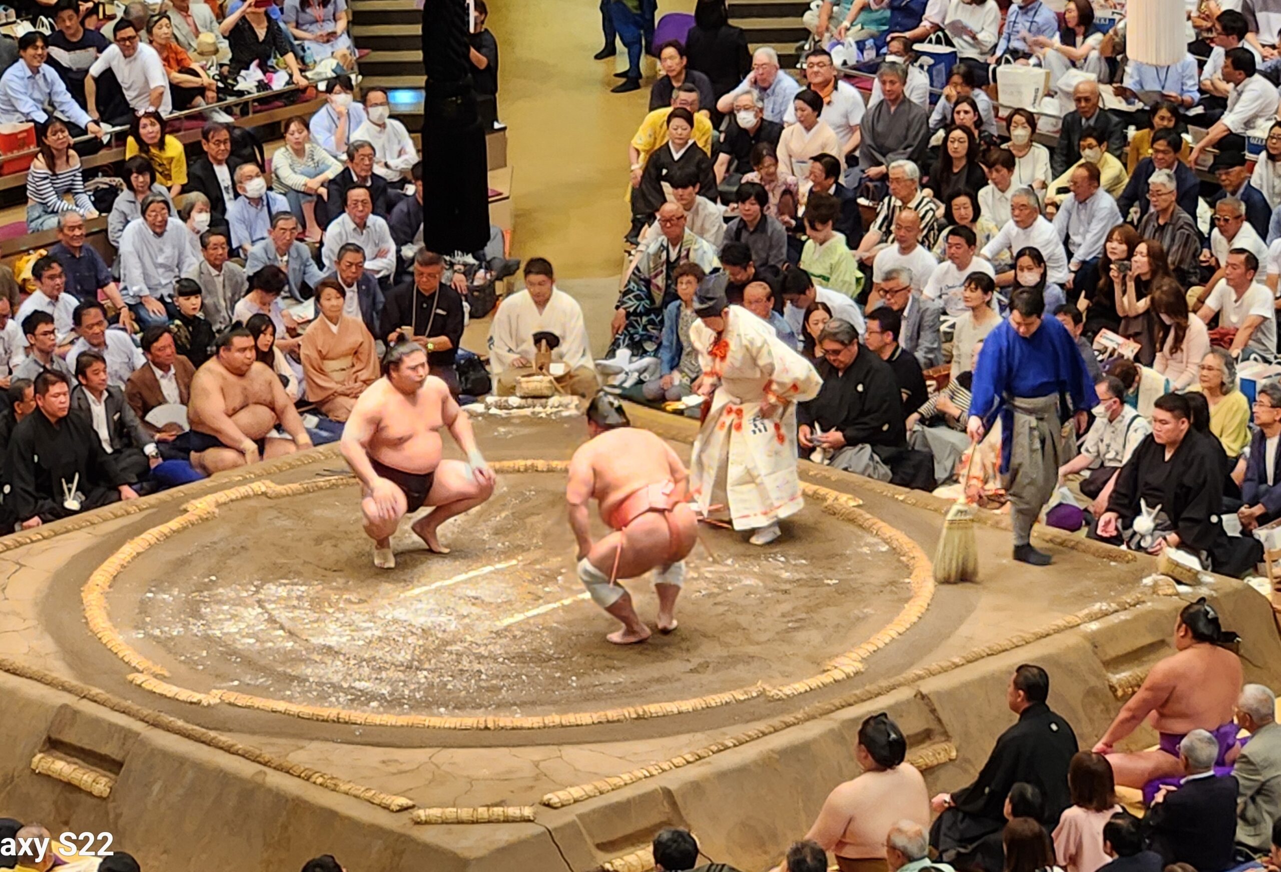 Dohyo-iri and wrestlers at the ring